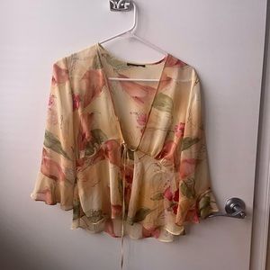 Beautiful sheer floral top with tie front